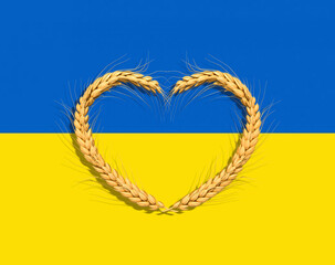 Ukraine. Spikelets in the shape of a heart on the background of the flag of Ukraine. 3d illustration