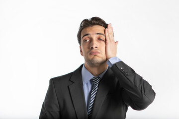 Close up portrait of depressed and tired businessman isolated on white background
