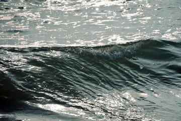 Fototapeta premium Waves on the beach. Power of sea waves in the coastal seashore of Mahabalipuram beach, Tamilnadu, India.