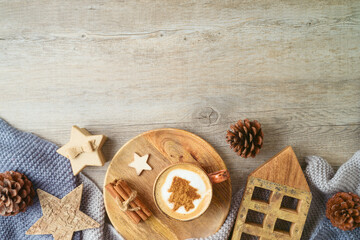 Christmas holiday background with coffee cup and eco friendly decorations. Hygge Scandinavian style...