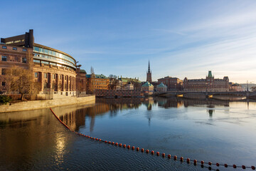 Stockholm. Frozen bay with ducks, swans and geese. Ice cold in Sweden