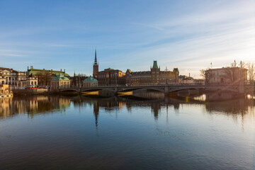 Stockholm. Frozen bay with ducks, swans and geese. Ice cold in Sweden