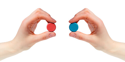 Hands holding red and blue pills isolated on white background. Choice between two options, truth,...
