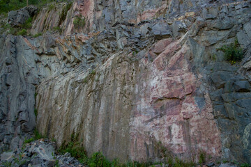 granite rock wall in the quarry
