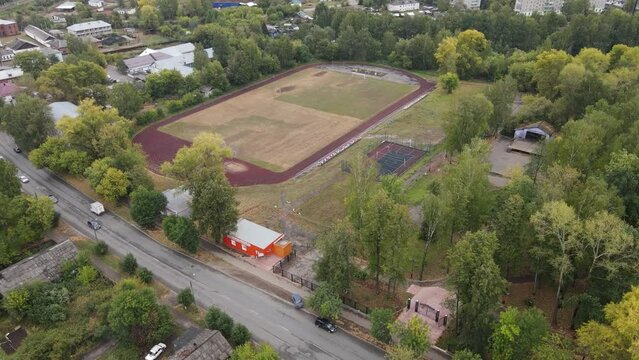 Sports field in small local town from drone
