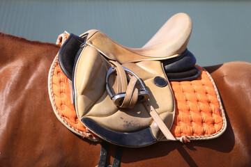 Close up of a sport horse saddle. Quality classical leather saddle