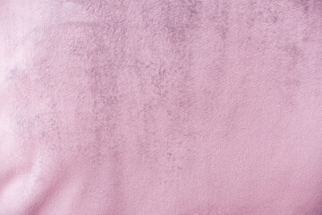 Pink velvet fabric surface from above. velvet texture pink color background. expensive luxury fabric, material, wallpaper.