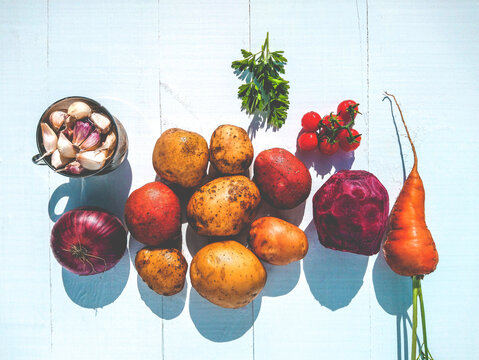Products for autumn borscht lie on a white background. Preparation of borscht