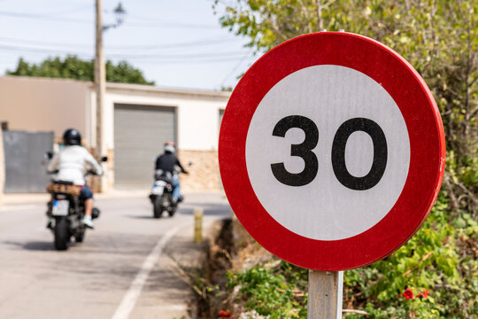traffic sign limiting speed to 30 kilometers per hour, Randa, Majorca, Balearic Islands, Spain