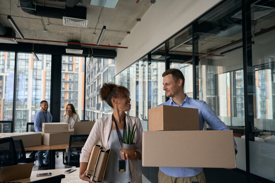 Happy Corporate Workers Preparing For Office Relocation