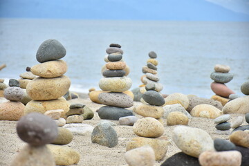 Stones stacked by tourists are seen on the shore of the Puerto Vallarta boardwalk on August 3, 2022 in Puerto Vallarta, Mexico. (Photo by Carlos Tischler/ Eyepix Group)