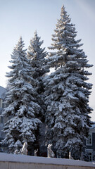 Sculptures of Soviet pioneers in the winter park. The history of pioneering in frozen sculptures.
