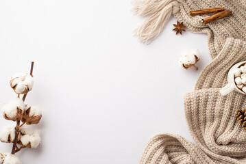 Winter mood concept. Top view photo of knitted scarf cup of cocoa with marshmallow anise cinnamon...