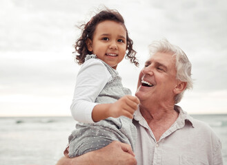 Beach, happy and elderly man with his grandchild on a family vacation during spring time. Travel,...