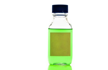 green chemical solution in a reagent bottle