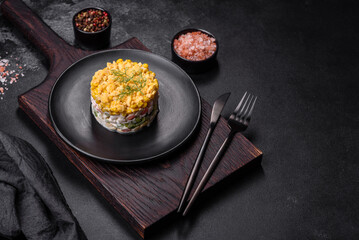Fresh vegetable salad with corn, pepper, crab, cucumber, eggs and mayonnaise