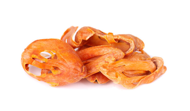 Mace, nutmeg flower, myristica fragrans, isolated on white background. Natural spice in Indian cooking. Asian seasoning for baking and desserts.