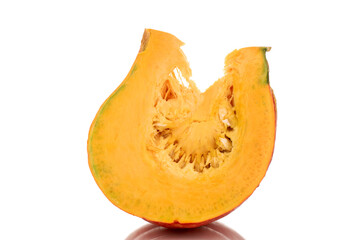 One part of ripe organic pumpkin, macro, isolated on white background.