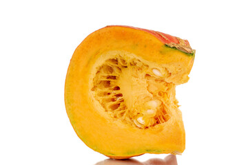 One part of ripe organic pumpkin, macro, isolated on white background.
