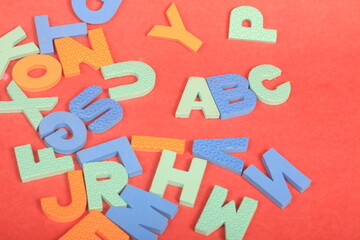 alphabet on red background

