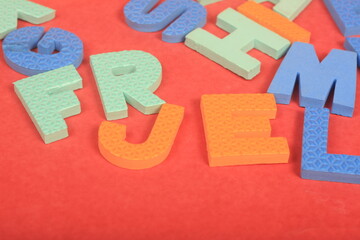 alphabet on red background

