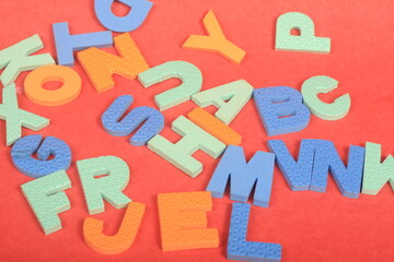 alphabet on red background

