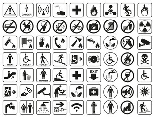 A set of basic signs that are used in public places. Black and white monochromatic signs on a white background.