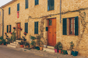 Fototapeta na wymiar Narrow old streets with mediterranean plants