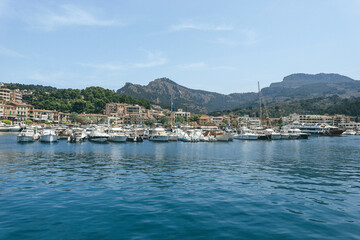 Fototapeta na wymiar Beautiful look at mediterranean seaport with small wooden boats 