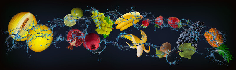 Fototapeta na wymiar Panorama with juicy fruits in the water - pineapple, grapes, strawberries, banana, pomegranate, lime, melon help people stay healthy