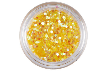 colored sequins in a plastic jar isolated on a white