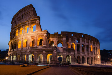 Fototapeta na wymiar Roman Colosseum at sunrise with clouds, no people