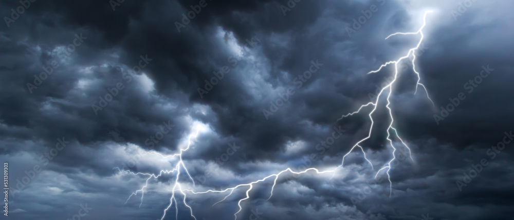 Poster The dark sky with heavy clouds converging and a violent lightning storm before the rain.Bad or moody weather sky and environment. carbon dioxide emissions, greenhouse effect, climate change.