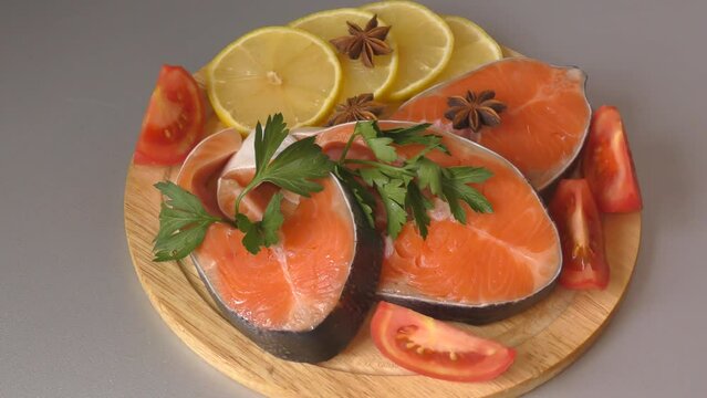 Trout steak (Latin. Salmo trutta) with fresh vegetables