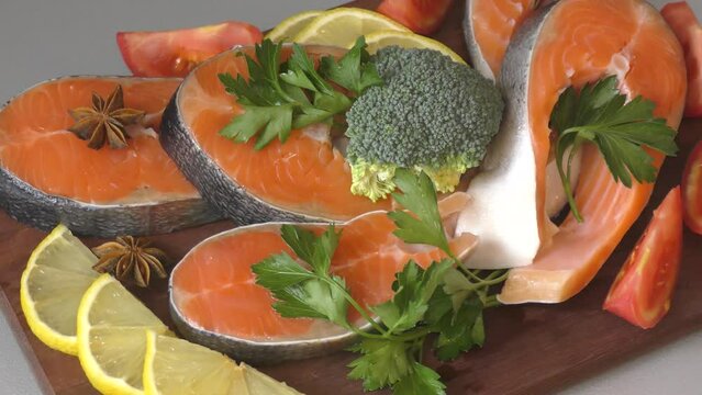 Trout steak (Latin. Salmo trutta) with fresh vegetables