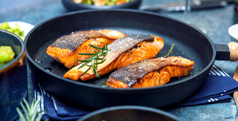 Roasted salmon fillet steak in a pan