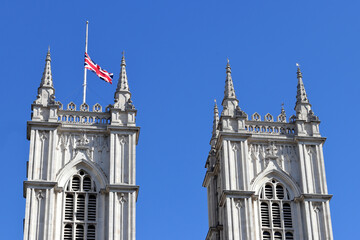 The Union Flag flying half-mast on the Westminster Abbey in London, UK