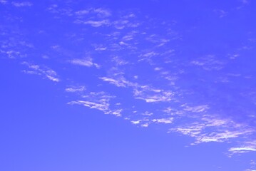 Clear peaceful blue sky on which white clouds float leisurely, banner, screensaver