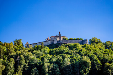 Fototapeta na wymiar Le Chateau de la Cité médiévale de Gruyères en Suisse