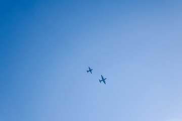 Military aircraft flying in formation above Italy
