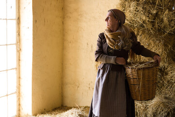 Medieval woman with hay basket