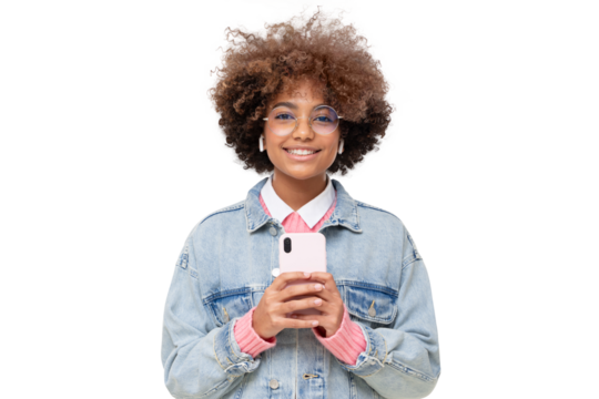 African girl with afro hairstyle and eyeglasses holding phone with both hands, isolated