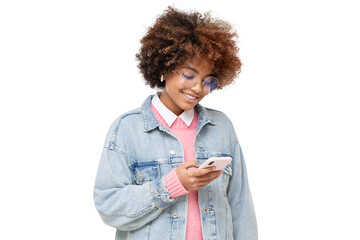 Smiling african american teenage girl with afro hairstyle, holding  phone with one hand, chatting with friend, using social media app, isolated