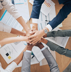 Team hands, collaboration and meeting of business people in agreement together above papers at work in the office. Group of employee hand in teamwork, agree and pile for company goal strategy or plan - obrazy, fototapety, plakaty