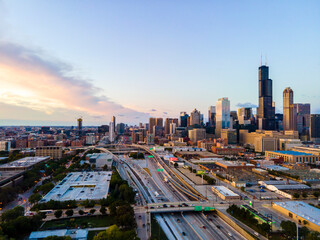 Naklejka na ściany i meble Chicago, IL USA September 15th 2022 : establishing aerial drone view image of Chicago metropolitan city area. the buildings architecture look great for tourist to come and see the skyline