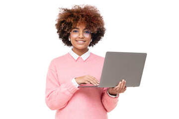 Smiling african american teen girl, high school or online course student holding laptop and looking...