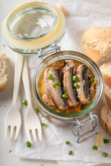 Tasty smoked sprats as a mediterranean appetizer.