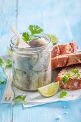 Delicious and fresh pickled fish with onion and herbs.