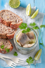 Delicious and fresh pickled fish as popular Polish snack.