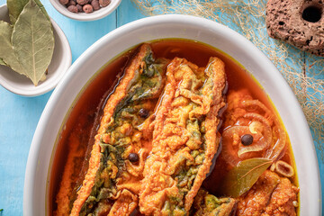 Delicious roasted mackerel pickled with allspice and bay leaf.